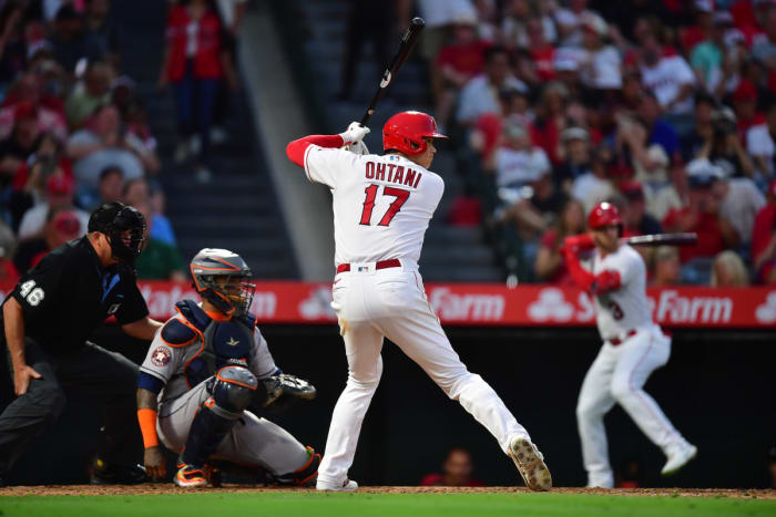 Shohei Ohtani sets up for an at bat with his back to the camera